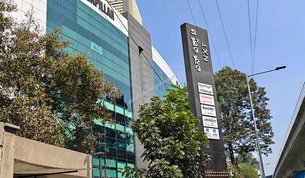 Caterpillar office at RMZ NXT Campus located approximately 6 km from Prestige Evergreen