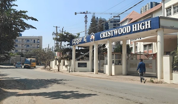 The grand entrance gate of Crestwood High school situated near the Prestige Evergreen community providing easy access to quality education