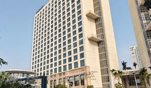 Low angle full view of the Marriott hotel building architecture near Prestige Evergreen