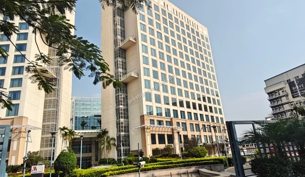 High rise view of the Marriott hotel building structure against blue sky near Prestige Evergreen