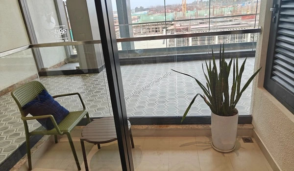 View of the spacious private balcony from the master bedroom at Prestige Evergreen featuring modern railings and tiling