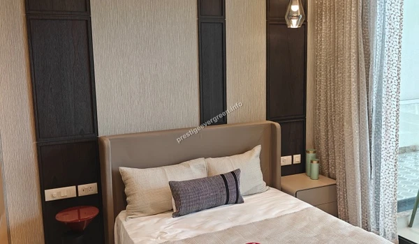 Second bedroom interior at Prestige Evergreen 1486 sqft unit featuring a sleek headboard and modern decorative wall panels