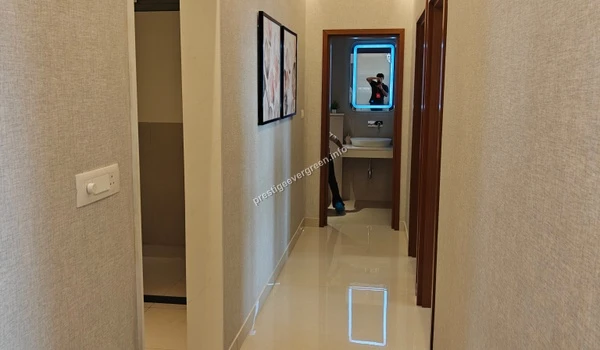 Polished internal hallway at Prestige Evergreen with neutral wall finishes and premium tile flooring