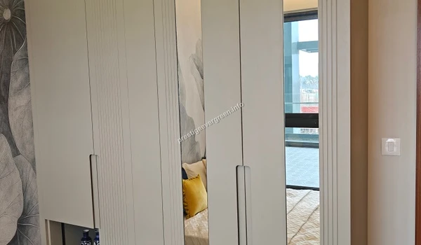 Full-length mirrored wardrobe doors in the Prestige Evergreen 1486 sqft model home bedroom enhancing space and light