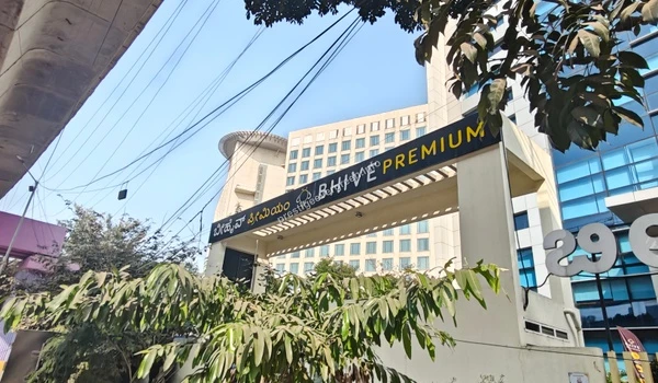 Entrance arch of BHIVE Premium coworking space highlighting the modern amenities near Prestige Evergreen