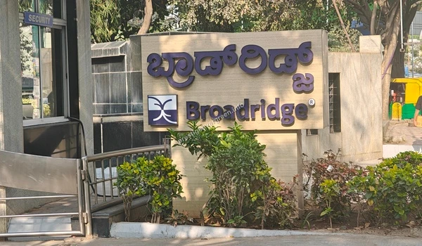 Entrance signage board of Broadridge Financial Solutions near Prestige Evergreen