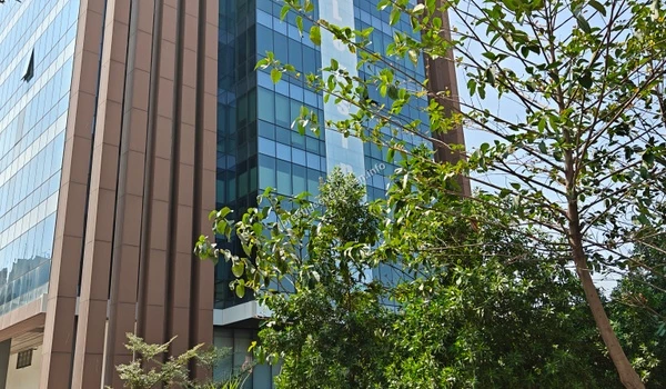 Close-up of a contemporary IT office complex showcasing the commercial growth around the Prestige Evergreen project