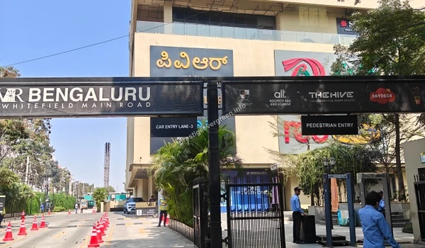 Close-up of the Nexus Mall Whitefield facade featuring INOX and lifestyle brands, offering great leisure options near Prestige Evergreen.