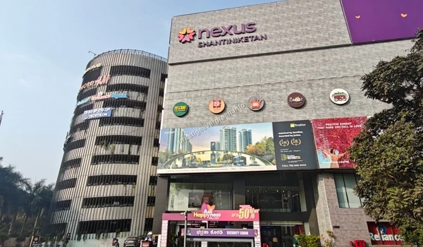The grand main entrance to Nexus Shantiniketan featuring Toscano and other premium outlets, perfect for dining outings from Prestige Evergreen.