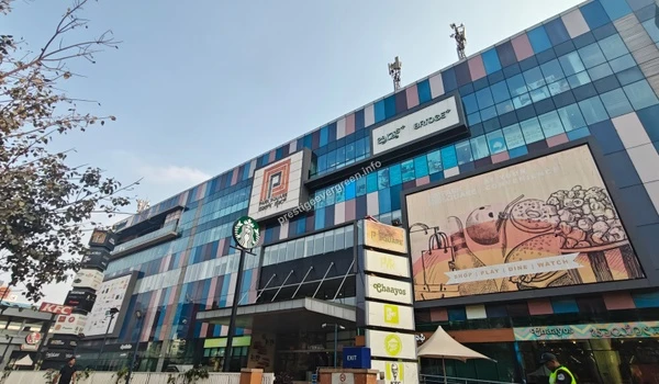 The colorful exterior of Park Square Mall in Whitefield, offering additional shopping, dining, and entertainment options conveniently close to Prestige Evergreen.