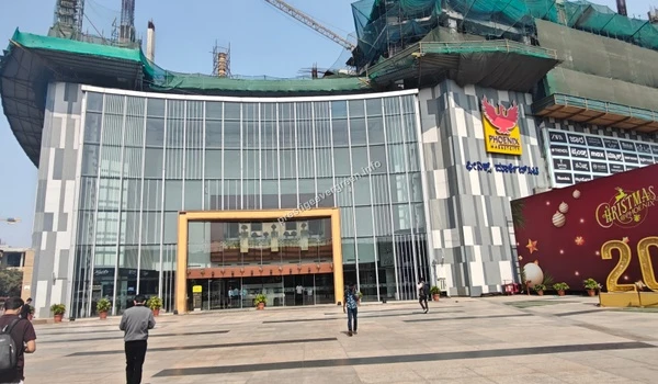 Visitors walking into Phoenix Marketcity, demonstrating the active and dynamic neighborhood that surrounds the upcoming Prestige Evergreen development.