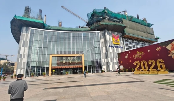 The spacious front plaza at Phoenix Marketcity adorned with festive decorations, highlighting the vibrant social life near Prestige Evergreen.