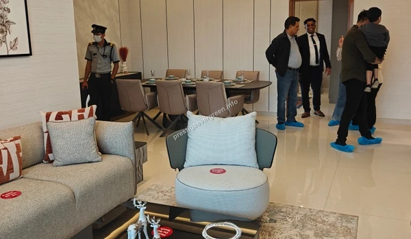 Perspective view of the living and dining hall in a 3 BHK at Prestige Evergreen emphasizing the premium interior layout and spatial design