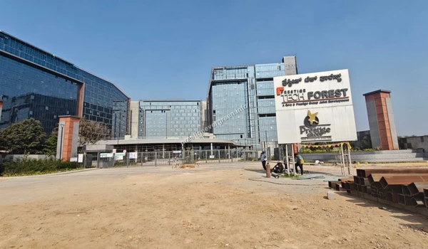 Exterior view of the Prestige Tech Forest IT park development featuring modern glass infrastructure near Prestige Evergreen