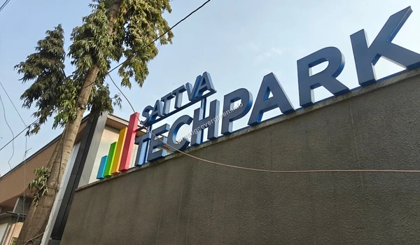 Bold signage of Sattva Tech Park, signifying the advanced technological and professional environment adjacent to Prestige Evergreen