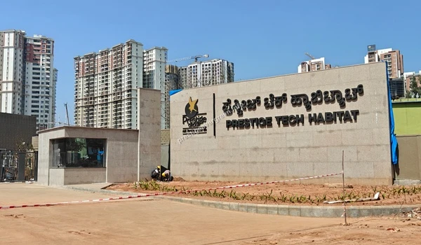 Wide angle view of the Prestige Tech Habitat office building and entrance area located in close proximity to the Prestige Evergreen project