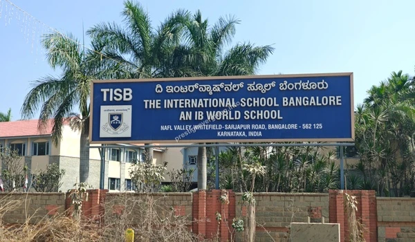 The official entrance board of The International School Bangalore (TISB) located on Sarjapur Road near Prestige Evergreen