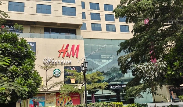 Pedestrian entrance to VR Bengaluru showcasing PVR and other amenities, an upscale mall conveniently close to Prestige Evergreen.