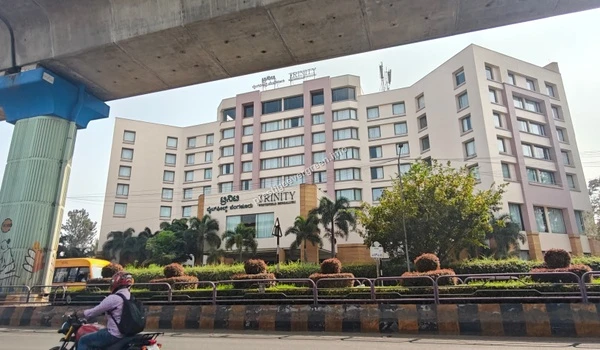Street level view of Trinity commercial building near Prestige Evergreen