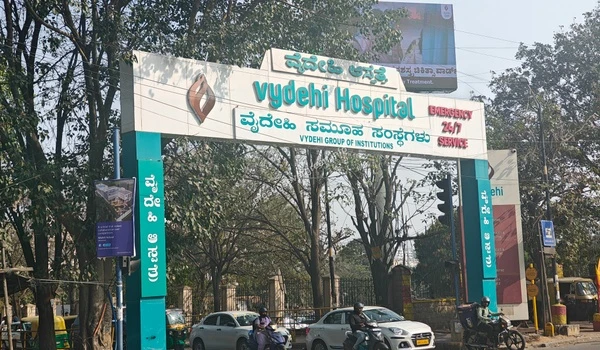 Exterior view of Vydehi Institute of Medical Sciences located approximately 7 km from Prestige Evergreen